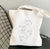 Tote Bag One Line Masques | Maison du Tote Bag